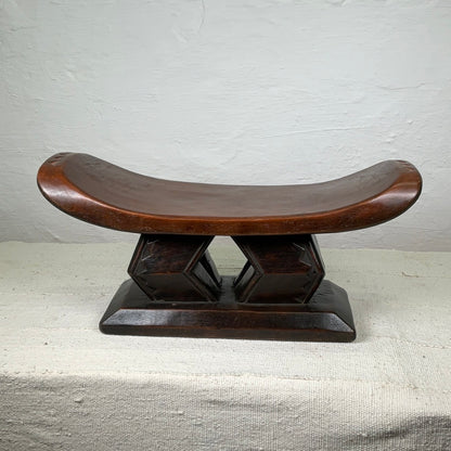 Ashanti stool #4 | GHANADESCRIPTION
This exquisit vintage Akan or Ashanti chair comes from Ghana and is made from wood and has beautiful tribal carvings. 

DIMENSIONS




 Height
25 cm


WiAfrican StoolsAshanti stool #4Ineza African Interior Art