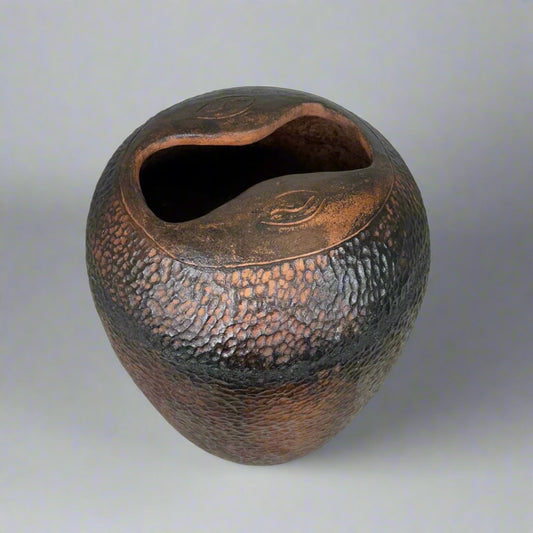 Vase Model A brushed #01 | IVORY COASTDESCRIPTION
This is a ceramic vase that is handmade and baked in a traditional wood fired oven by a wonderful family of artisans in a small village in a small villagVase ModelIneza African Interior Art