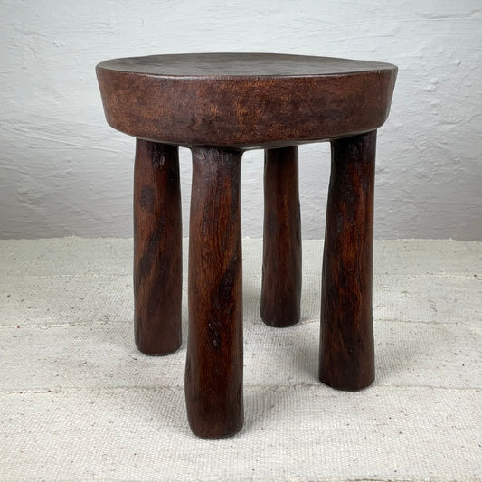 Lobi stool #01 | BURKINA FASSODESCRIPTION
This vintage Lobi stool is skilfully crafted from a singular pieceof lumber by the Lobi people. This versatile piece works as both a stool and side tableLobi stool #01Ineza African Interior Art